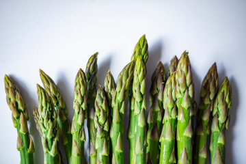 Collection of Raw Garden Asparagus with Clipping Path. Fresh Green Spring Vegetables Isolated on White Background. Edible Sprouts of Asparagus Officinalis Flat Lay and Top View