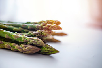 A bunch of asparagus await a fine meal. Asparagus. Raw asparagus. Fresh Asparagus.Green Asparagus. Vegetables: Asparagus Isolated on White Background