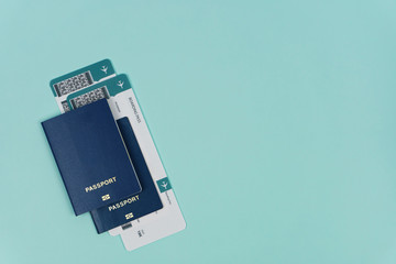 two foreign passports with plane tickets