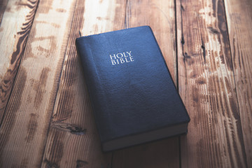 Holy Bible on the wooden table