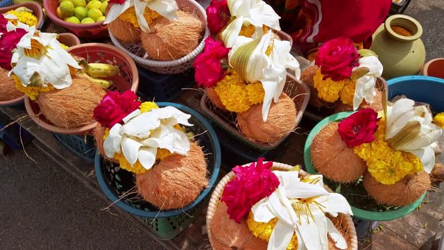 Flower and coconut offerings on the street market near Sri Chamundeshwari Temple, Mysore, India