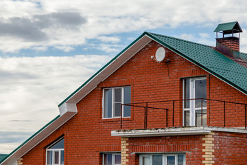 red brick house with sky