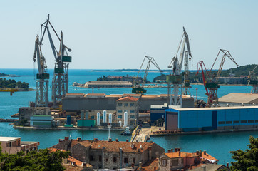 Obraz premium Shipyard cranes at Pula, Istria, Croatia