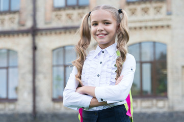 Happy first day at school. Little girl on September 1. Small child back to learn on September 1. Knowledge day. Start of school. September 1. Beginning of school year. Startup. Back in September 1