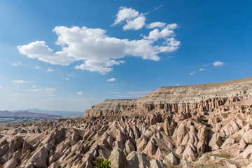 Volcanic formations in Red valley, Cappadocia, Nevsehir, Turkey.