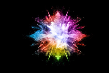abstract colored dust explosion on a black background.abstract powder splatted background,Freeze...