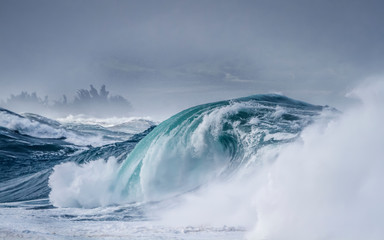 Giant Ocean wave breaking on the shore - 352328650