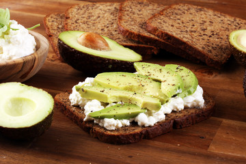 Sandwich with avocado with cream cheese for a healthy breakfast concept