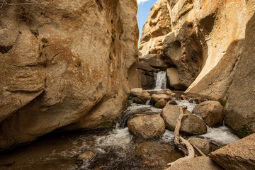 Hidden Falls waterfall on McGee Creek in natural rock canyon in the Buttermilks of Eastern Sierra Nevada mountains of California USA