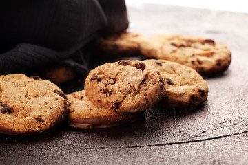 Chocolate cookies on wooden table. Chocolate chip cookies