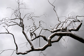 shiny branches as part of a sculpture of a metal tree