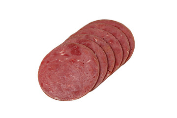 Sliced sausage slices lie on a white background. Isolated.