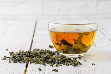 Green tea in a white cup.