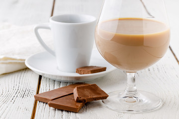 coffee in white ceramic cup and choco