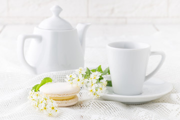 Coffee and French macaroons in white tone