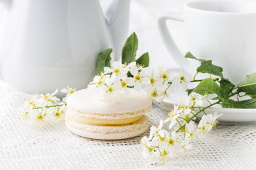 Coffee and French macaroons in white tone