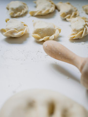 Traditional polish dumplings (called pierogi ruskie) filled with potatoes and cottage cheese. 