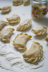 Traditional polish dumplings (called pierogi ruskie) filled with potatoes and cottage cheese. 