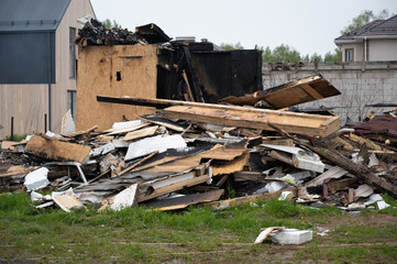Garbage heap after demolition of burned house