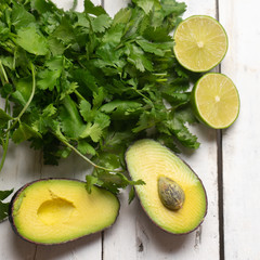 Mexican ingredients for guacamole sauce on white background
