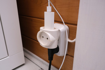 Overloaded outlet with an extension and many sockets plugged in and one vacant place, risk of fire...