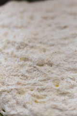 Rosemary focaccia dough on baking sheet