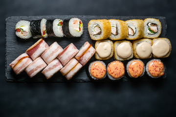 Set of different rolls on on a dark background horizontal