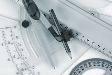 Architectural tools for drafting ruler protractor pair of compasses blue toned