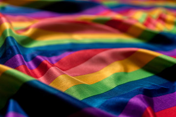 Gay pride flag vivid colors and wavy texture