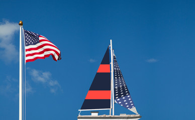 4th of July  independence day boat and USA flag against blue sky