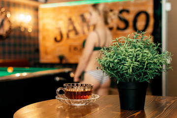 Cup of tea on the table in the sauna