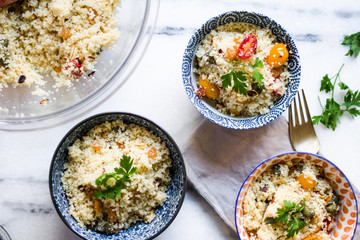 homemade couscous with cherry tomatoes and fresh herbs