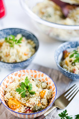 homemade couscous with cherry tomatoes and fresh herbs