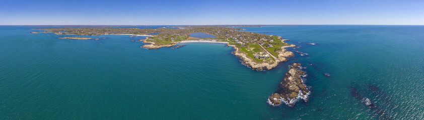 Fototapeta premium Aerial view of Bailey Beach and historic building the Waves on Ledge Road panorama at the end of Cliff Walk in city of Newport, Rhode Island RI, USA.