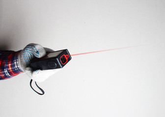 laser range finder builder hand in glove