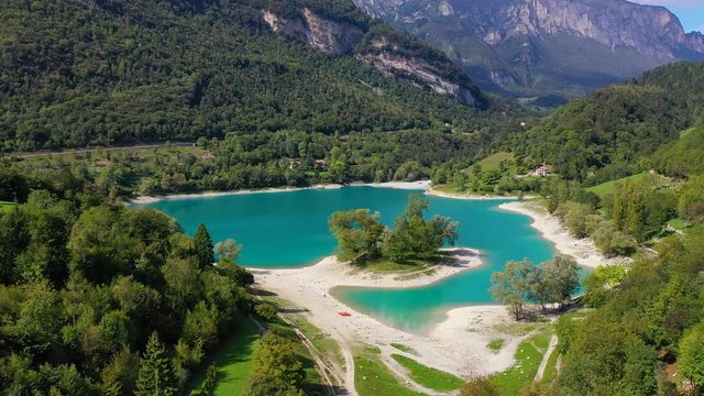 Aerial video with drone, view of the beautiful Lake Tenno in summer,Turquoise lake in the mountains,Trento,Italy, Europa.