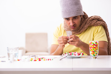 Young man suffering at home