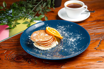 Close-up delicious pancakes, homemade pancakes,  on a rusty background. With copy space