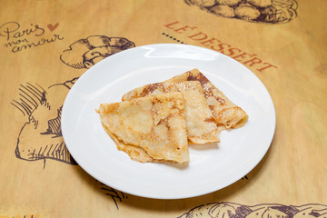 Close-up delicious pancakes, homemade pancakes,  on a rusty background. With copy space