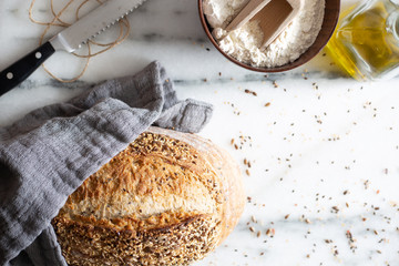 freshly baked homemade artisan sourdough bread top view.