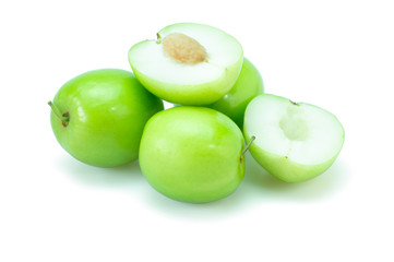 Fresh green jujube fruits, Delicious Chinese jujube fruits with slice isolated on white background. The file includes a clipping path easy to use. Close-up.