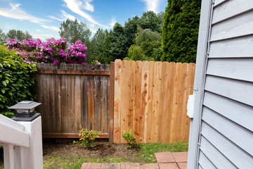 Side by side comparisons of new and old wooden fence