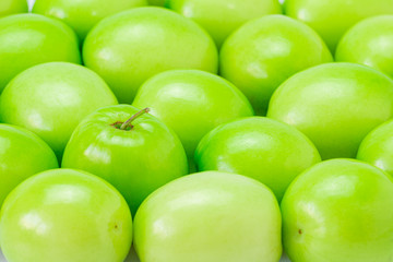 Fresh green jujube fruits, Delicious Chinese jujube sweet and crispy for the background. Close-up.