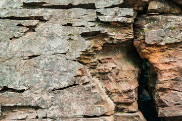 Natural rock wall with cleft