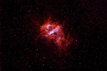 Beautiful red cosmic nebula in deep space. Elements of this image were furnished by NASA.