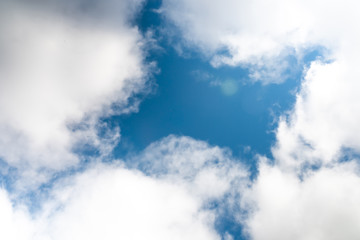 Beautiful sky with volumetric clouds, and the rays of the sun.
