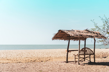 Tropical nature clean beach and white sand in summer with sun light blue sky and bokeh background.