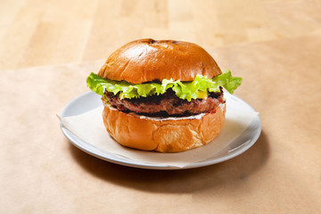 Beef burger on wooden background