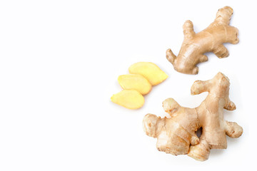 Closeup fresh organic ginger root with slice isolated on white background. Copyspace for text. Top view. Flat lay.