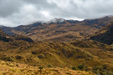 Nostalgic moody sky in the paramo high altitude ecosystem inside Cajas national park, Andes Mountains, Cuenca, Ecuador.